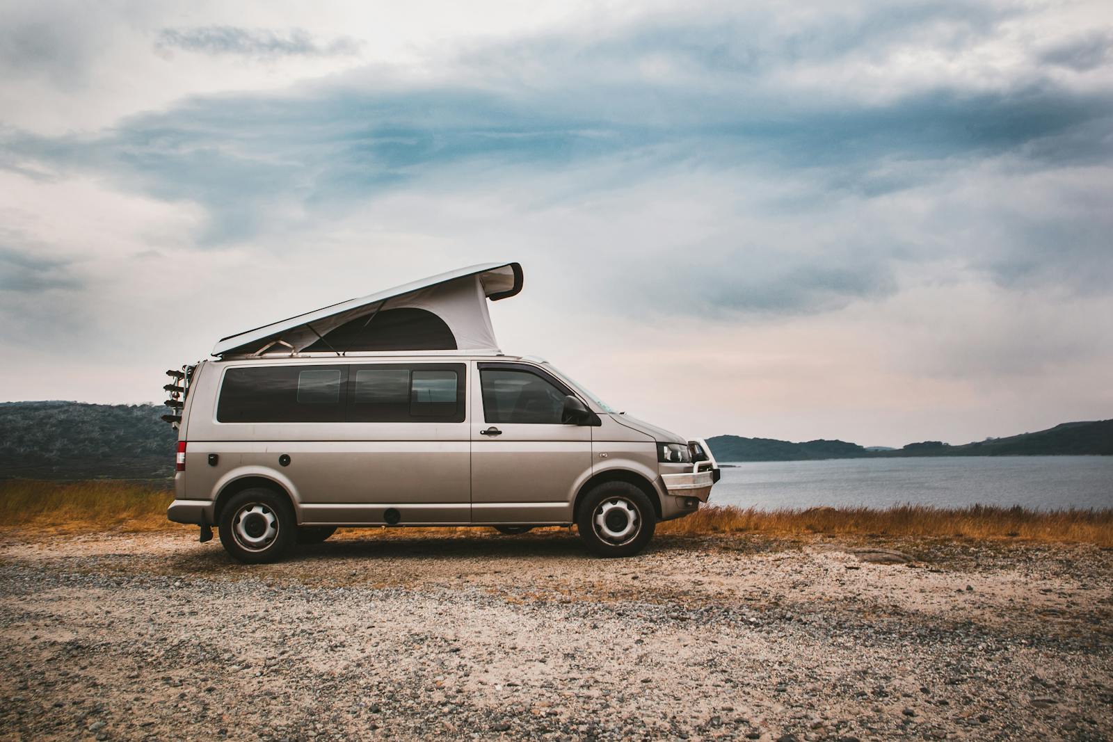 White Van on Brown Field Under White Clouds, RV